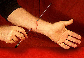 Needle Through Arm